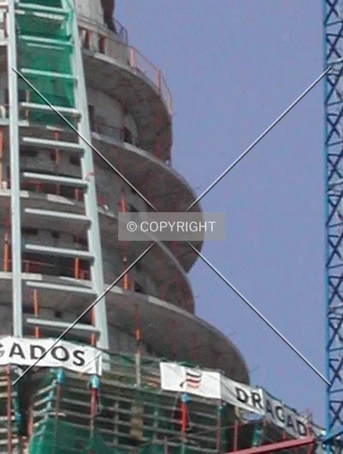 Close view of the top floors and their strange shapes