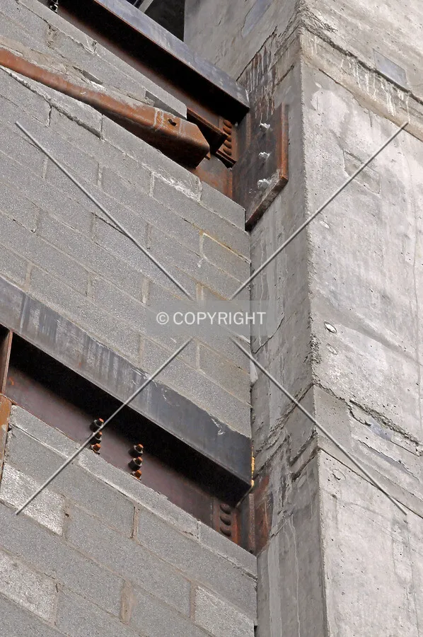 Connections of steel framed cantilever to the north side shear wall of the tower base