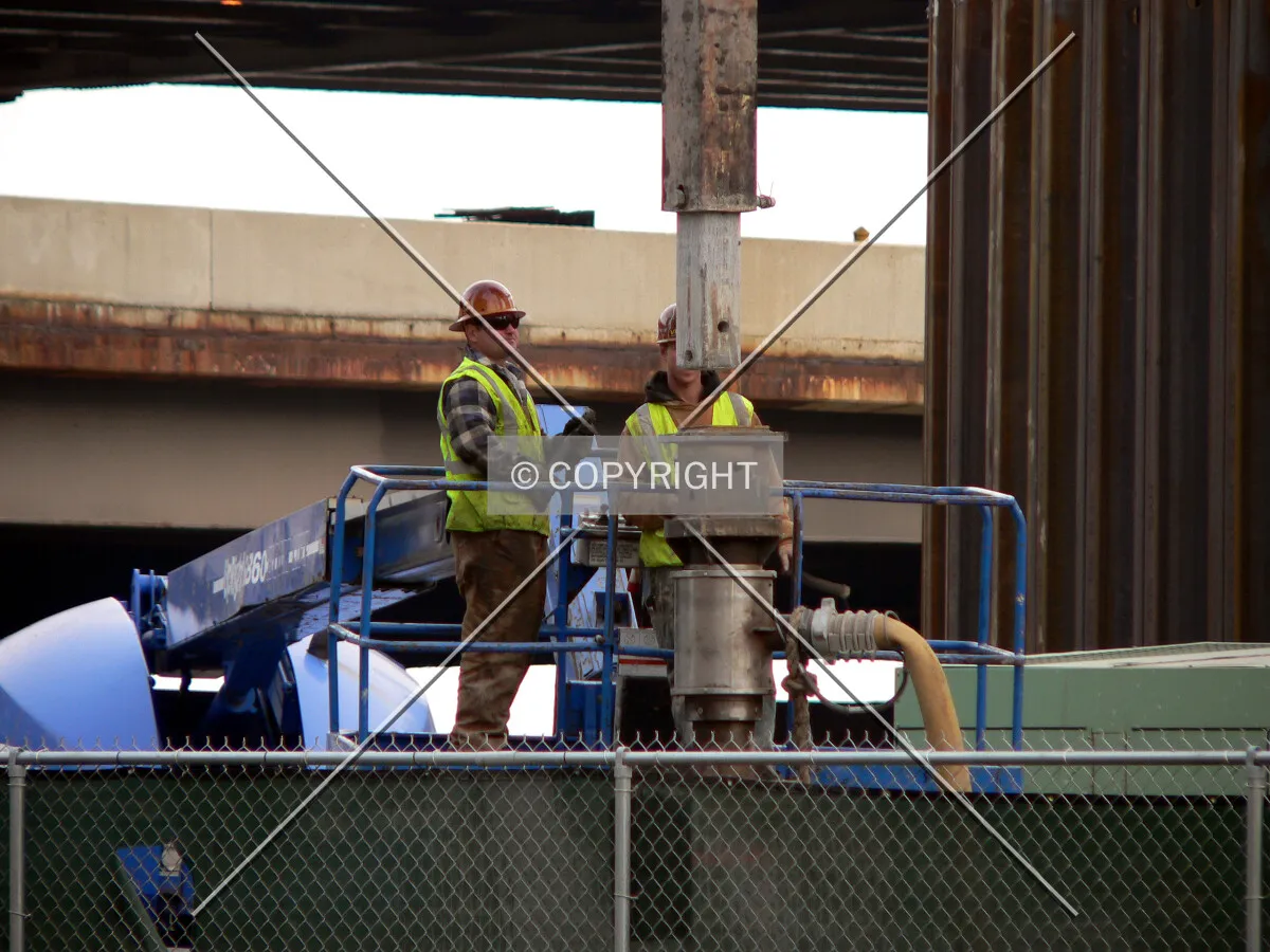 Hooking up an air attachment for caisson drilling