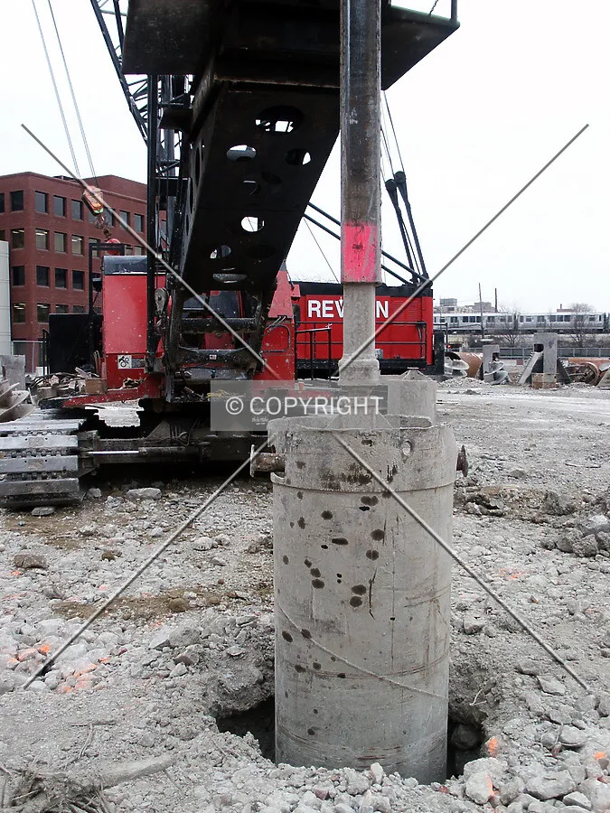 Drilling a caisson