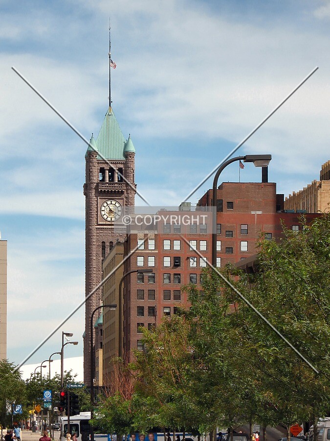 View from the Central Library along 4th Street, tower rising in the distance