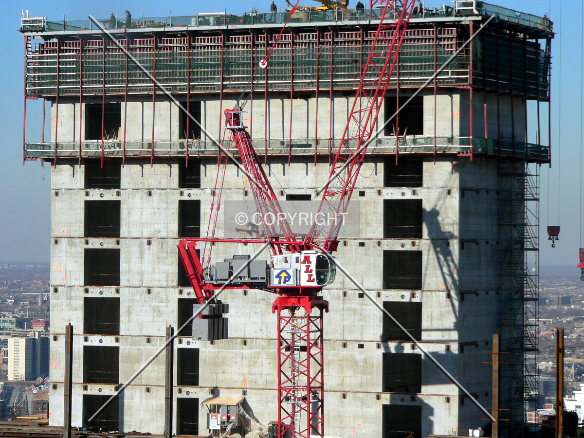 View of the core rising above the structural framing