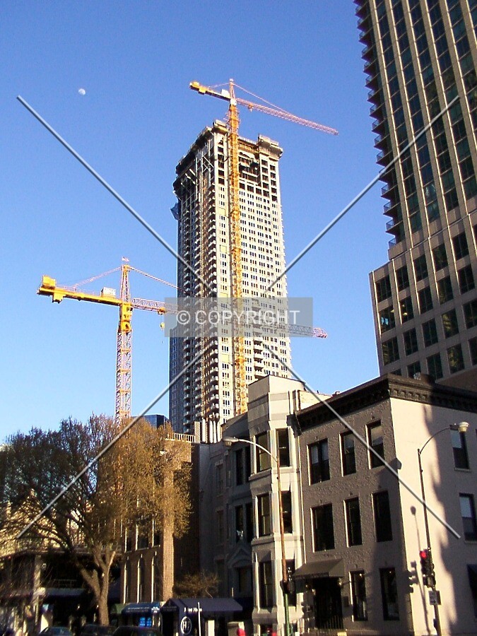 View from State Street with the moon and the Pinnacle's tower crane