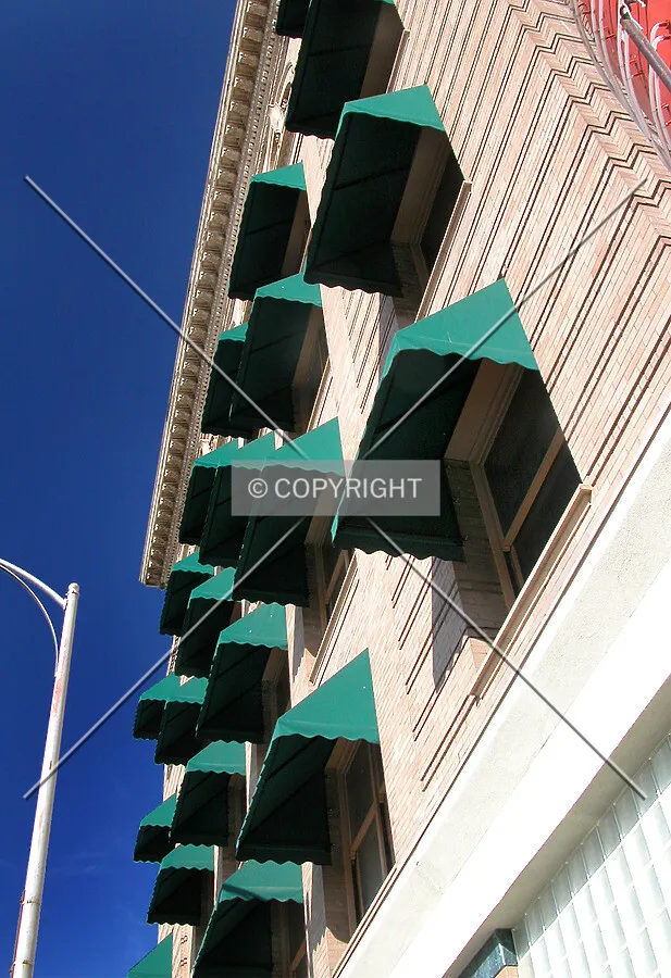 The signature awnings on the west face
