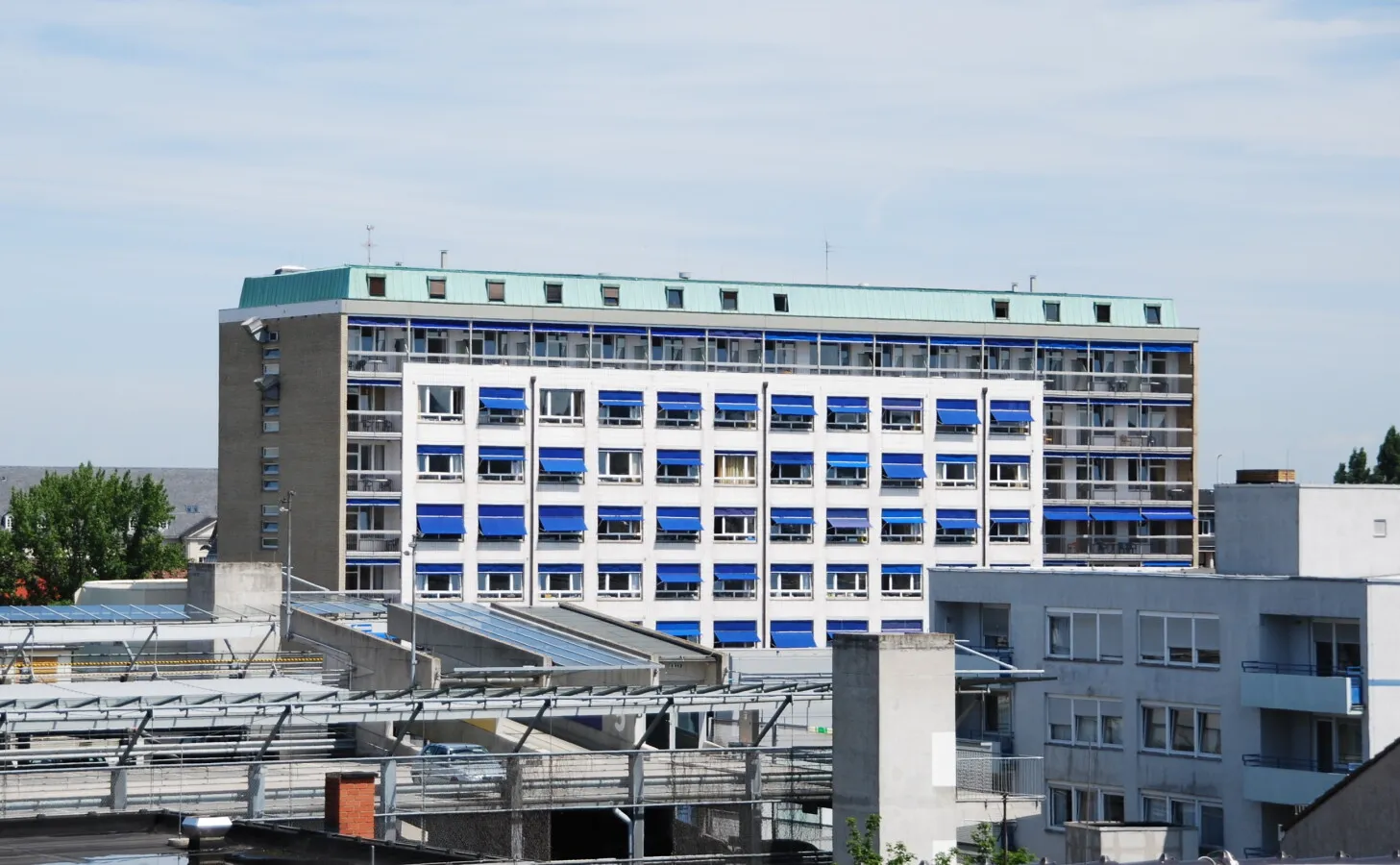 Top of the building seen over rooftops