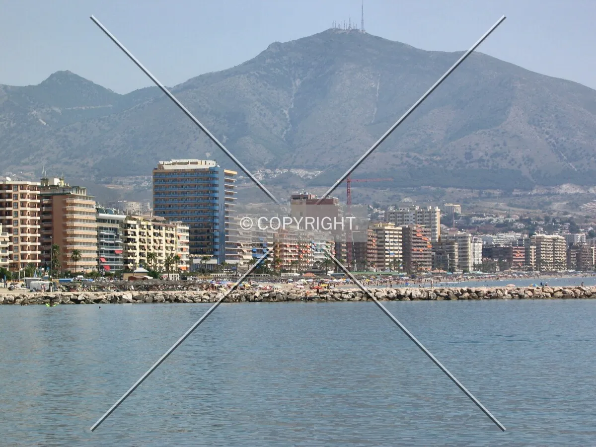 Los Boliches seafront, view from the port