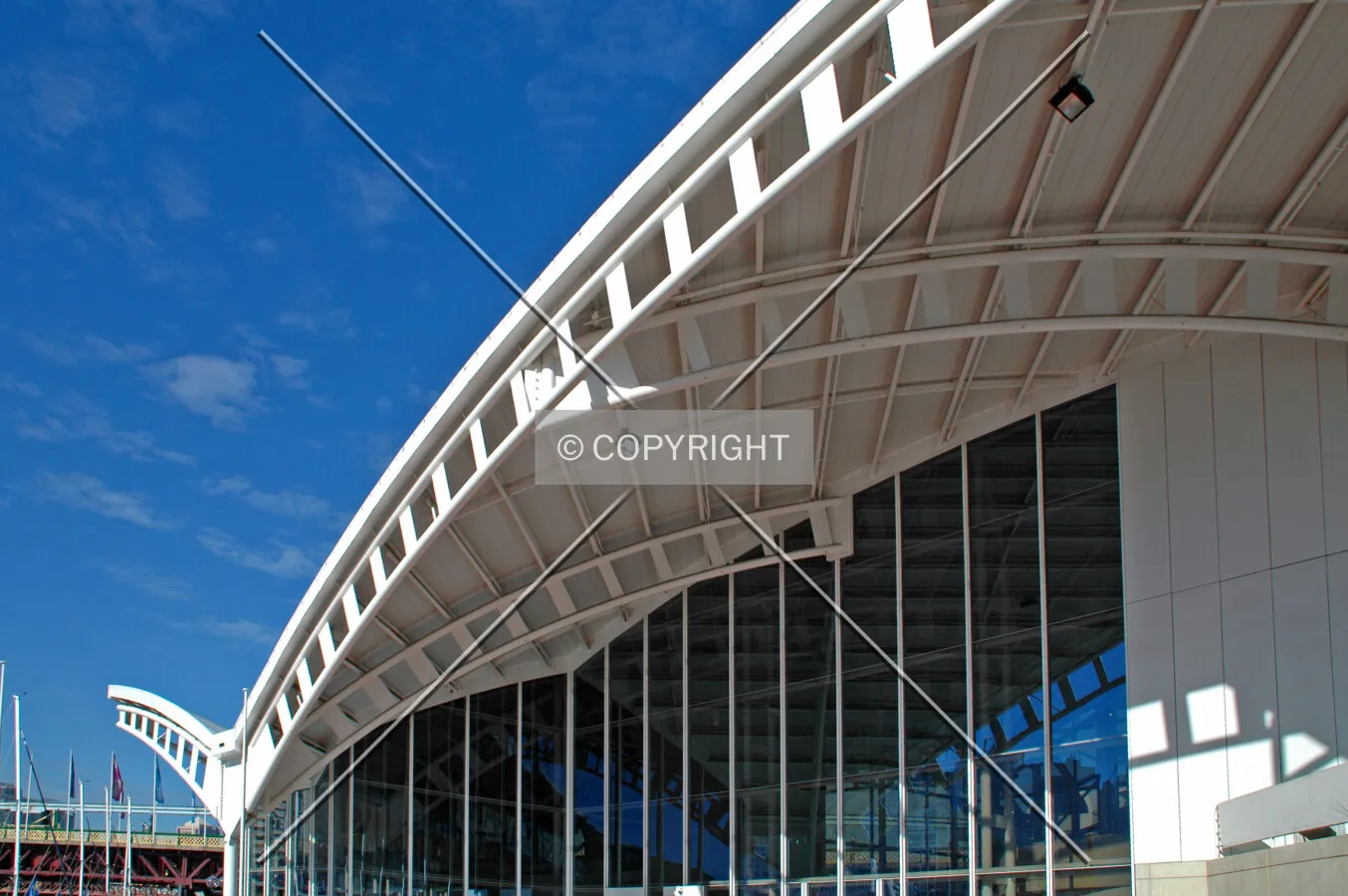 The glass wall and curved roof on the southeast corner
