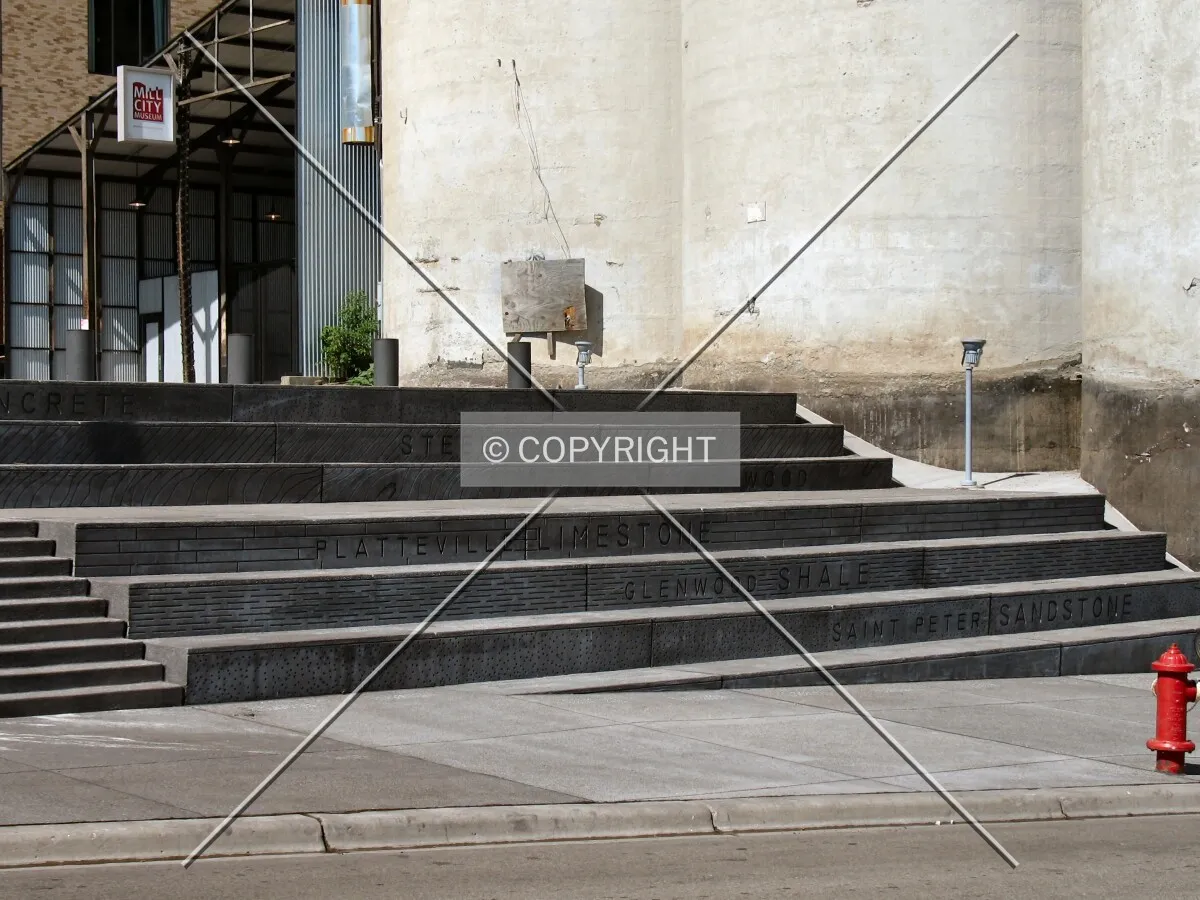 Steps up to Chicago Plaza from West River Parkway; Material indications present