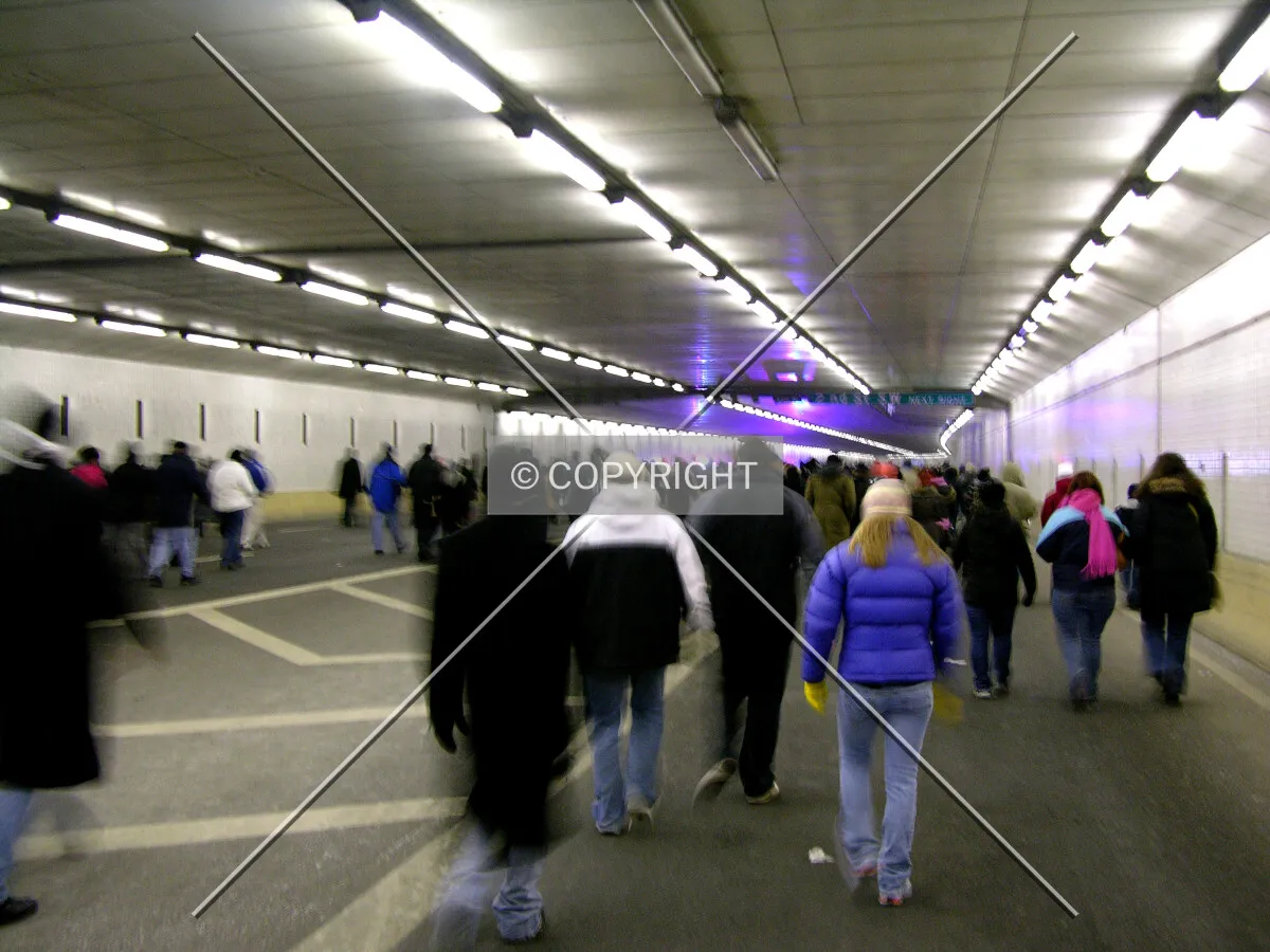Pedestrians utilizing the tunnel to cross beneath the National Mall prior to the inauguration of Barack Obama