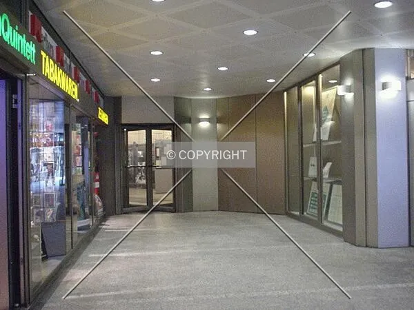 Shopping arcade below the building; entrance to office part of the tower