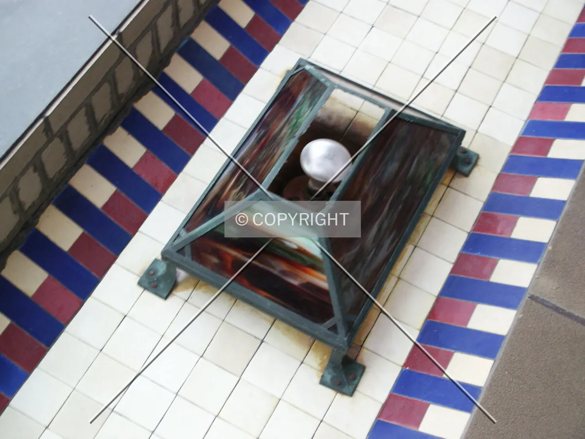 Stained glass lightshade over the entrance alcove
