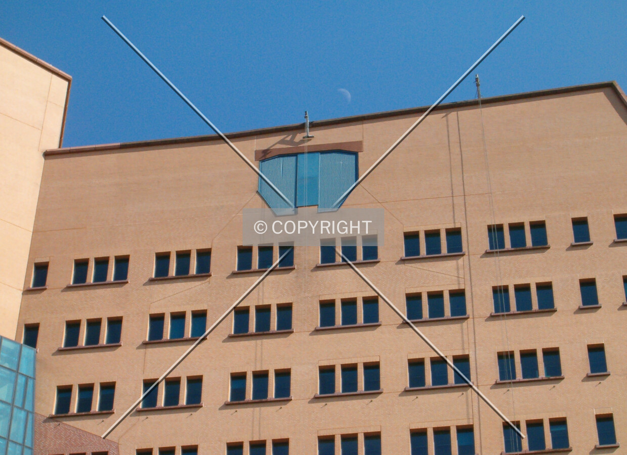Tackles at the top of the building