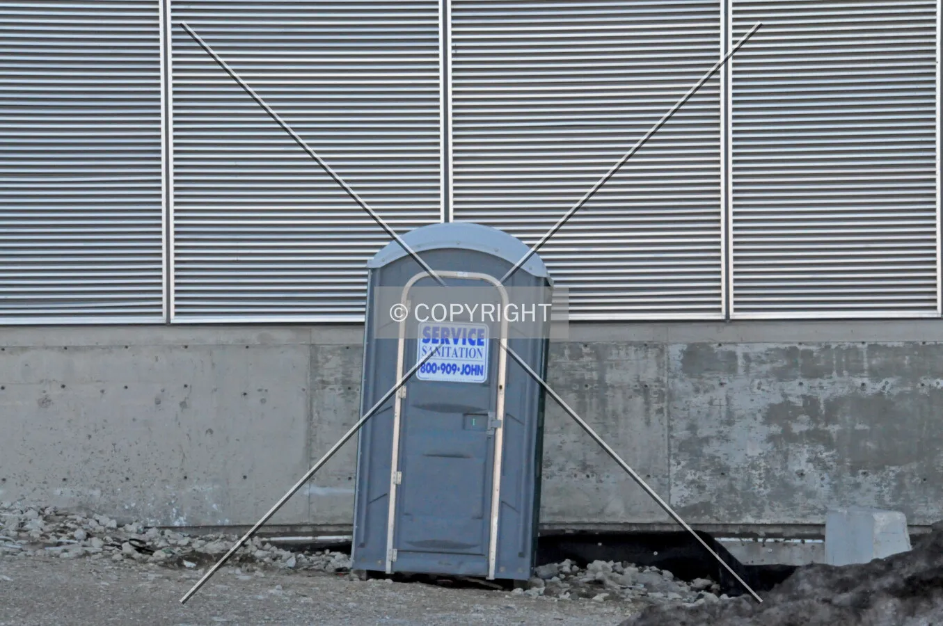 Portable toilet on the north side of the Maple Tower