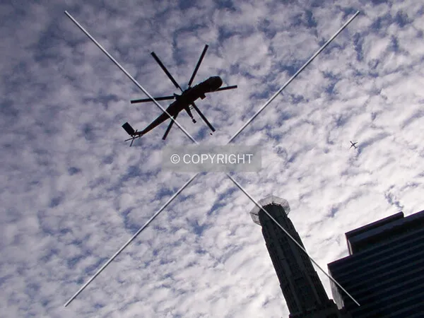 Helicopter coming in above the tower