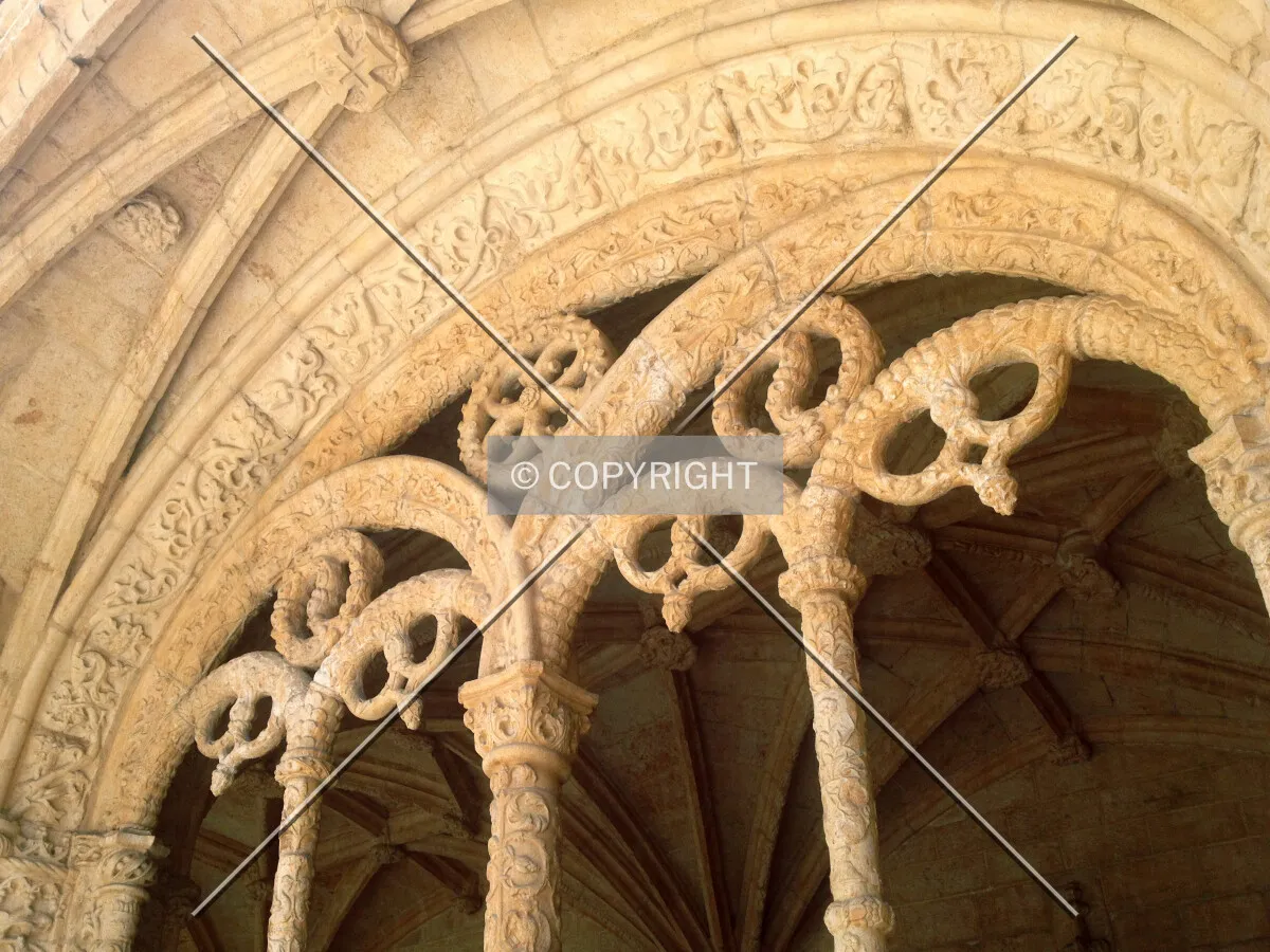 Pretzels in the tracery around the cloister