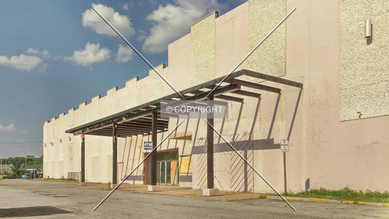 Rear entrance to the retail wing; May 6, 2015