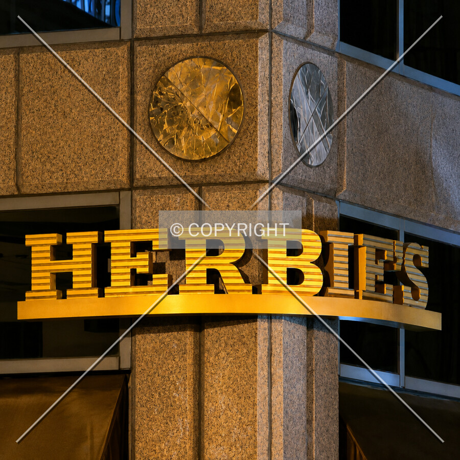 Signage on the northeast facade at night, Sunday, July 12, 2026