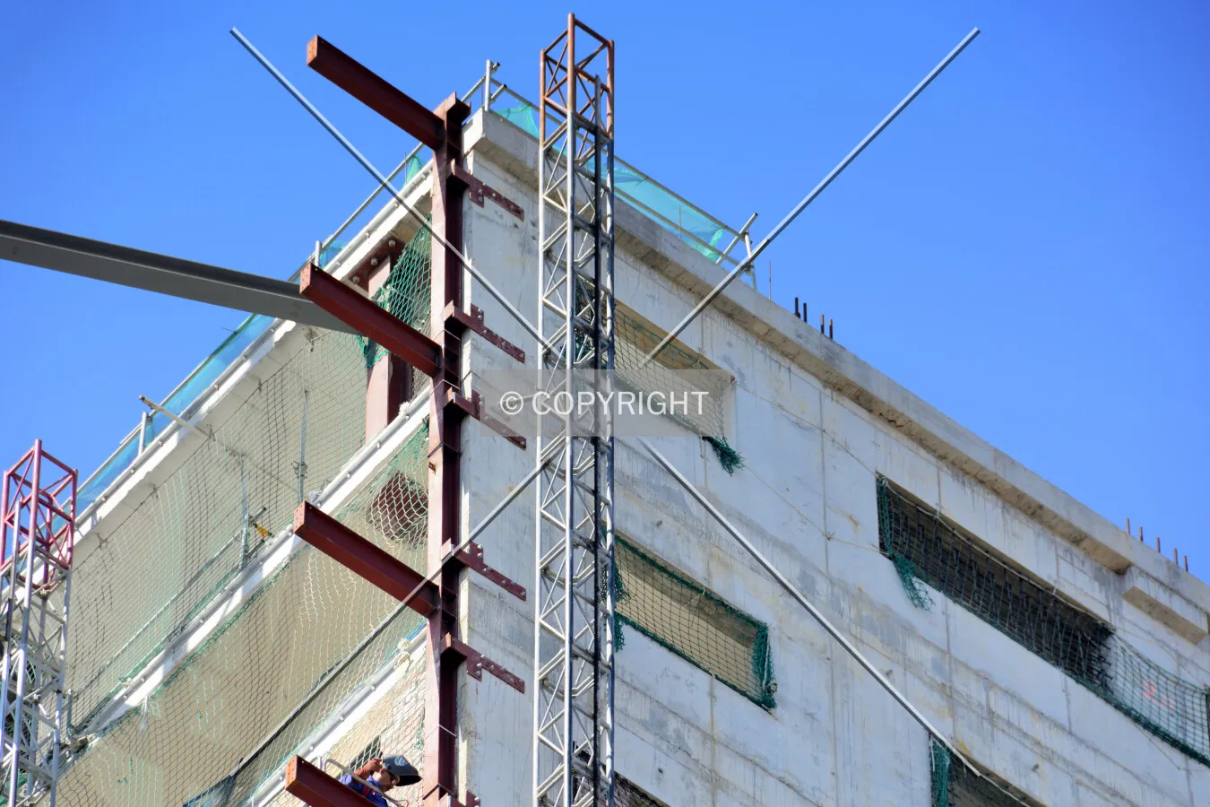 Close up view to the top of the building waiting for floor additions