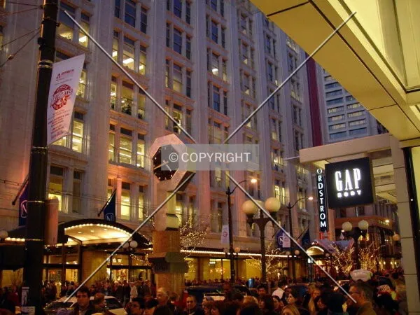 Friday night shoppers fill the sidewalks and streets