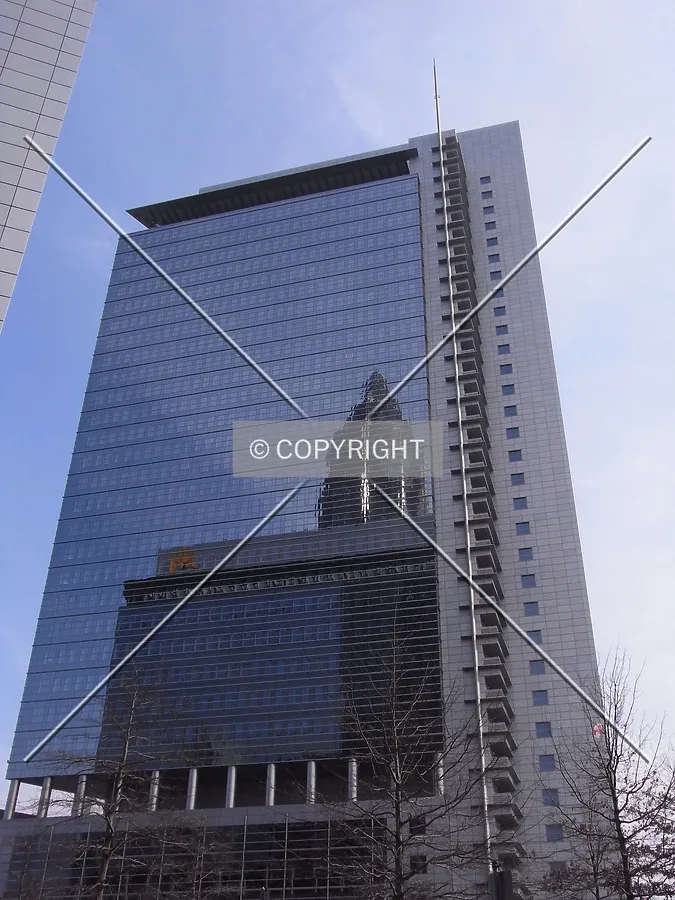 Facade with mirrored view of Kastor and top of MesseTurm