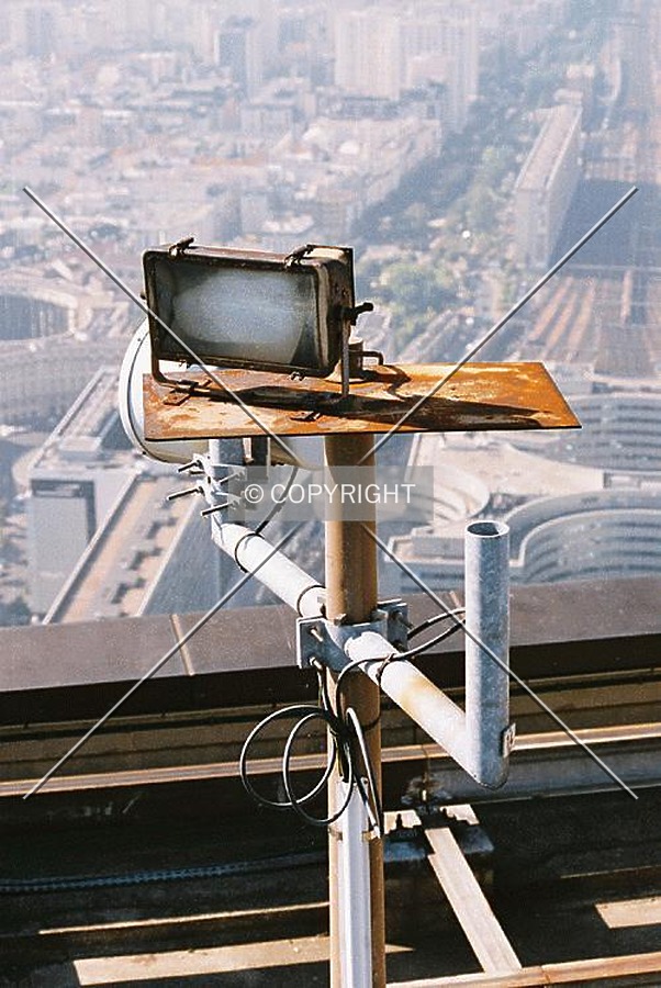 One of the rooftop lamps which illuminates the tower at night