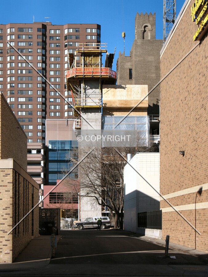 South core down the alley from 3rd Avenue South, Symphony Place in background