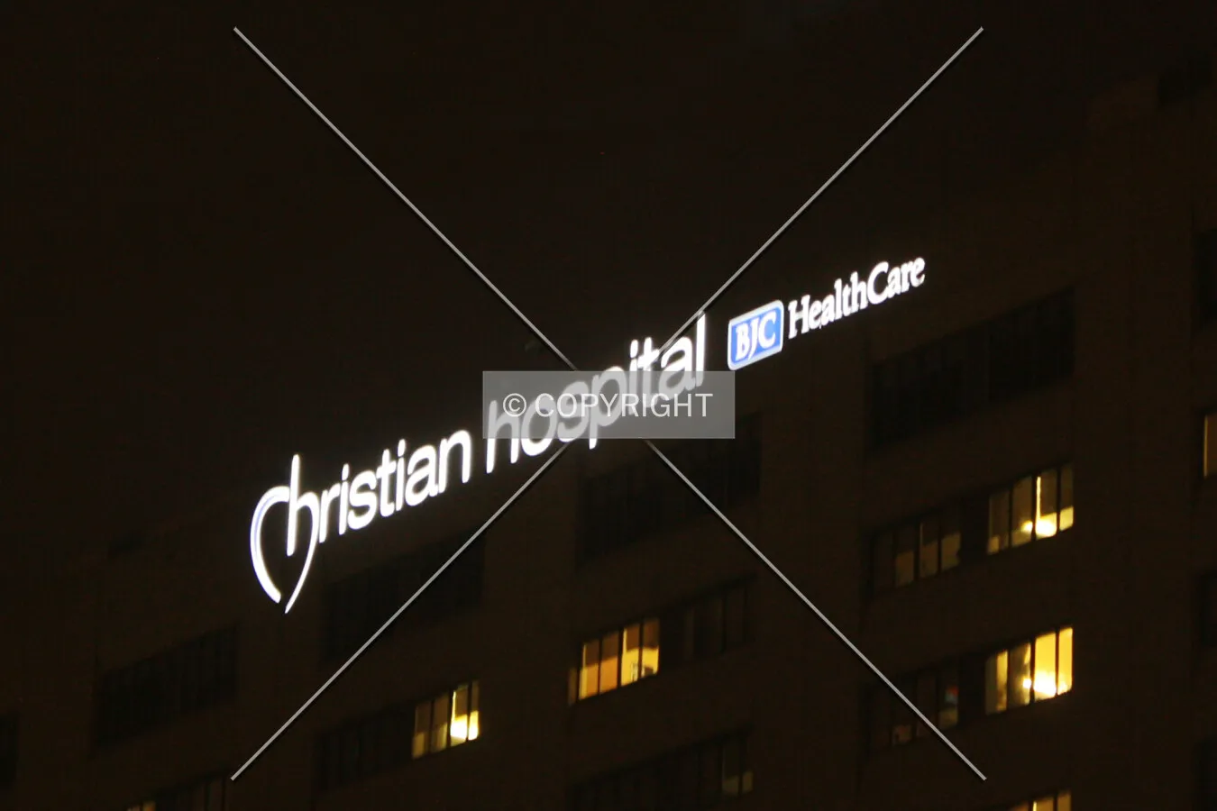 Sign on the south facade at night; December 20, 2014