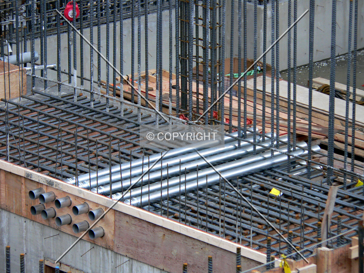 Piping being strung through the rebar
