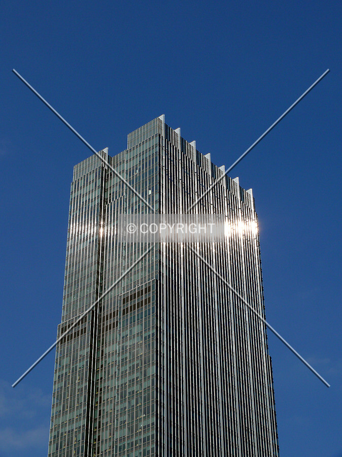 Sun shining on the top section of the tower