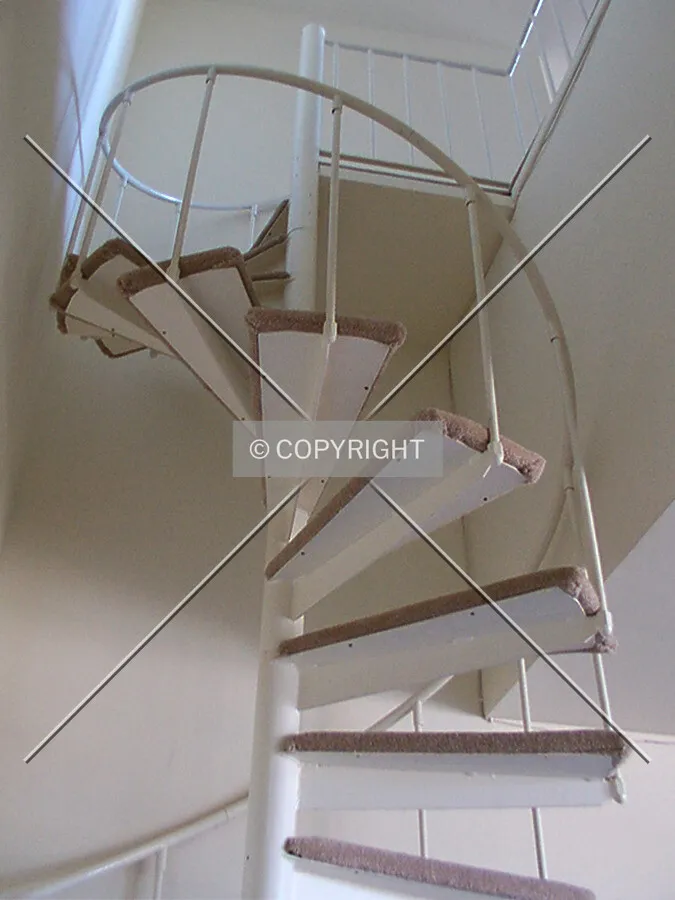 Spiral staircase to the 13th floor in the penthouse apartment