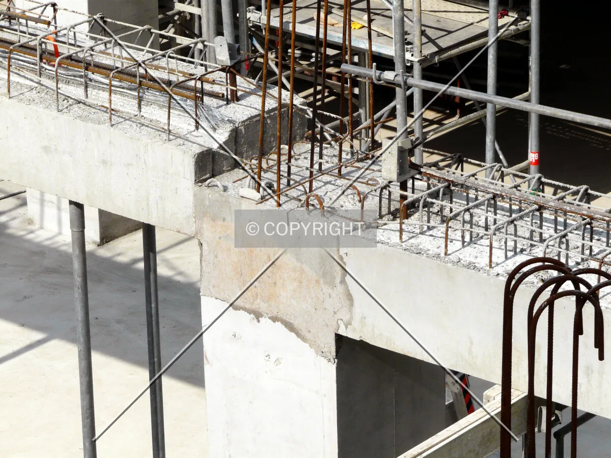 Precast concrete beam recently keyed on a column