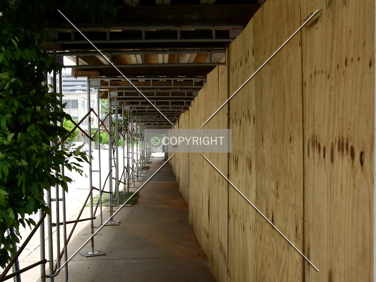 Covered sidewalk along South Poplar Street