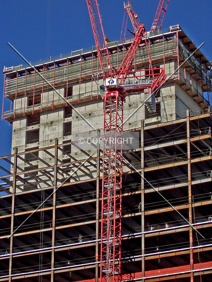 Elevator core and rising structural steel viewed from the south