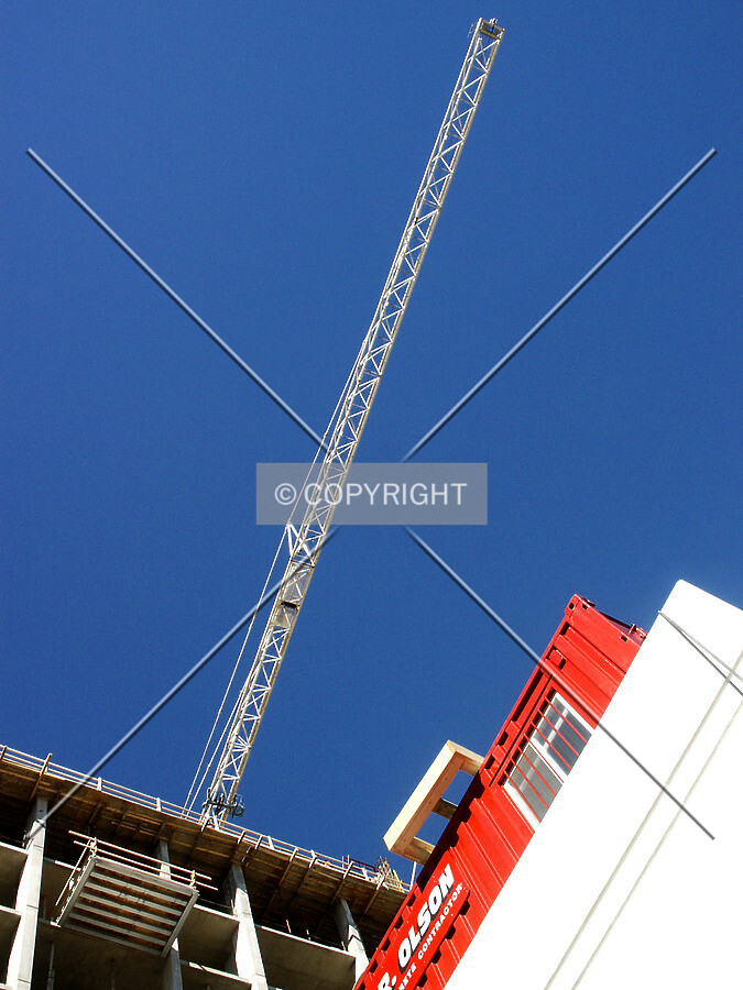 Looking up at the boom of the tower crane