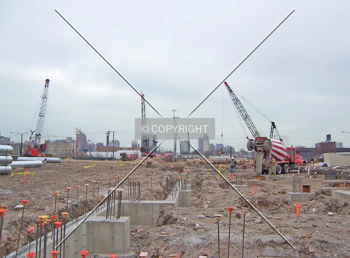 Looking east across the foundations of the convention center at the south end of the site