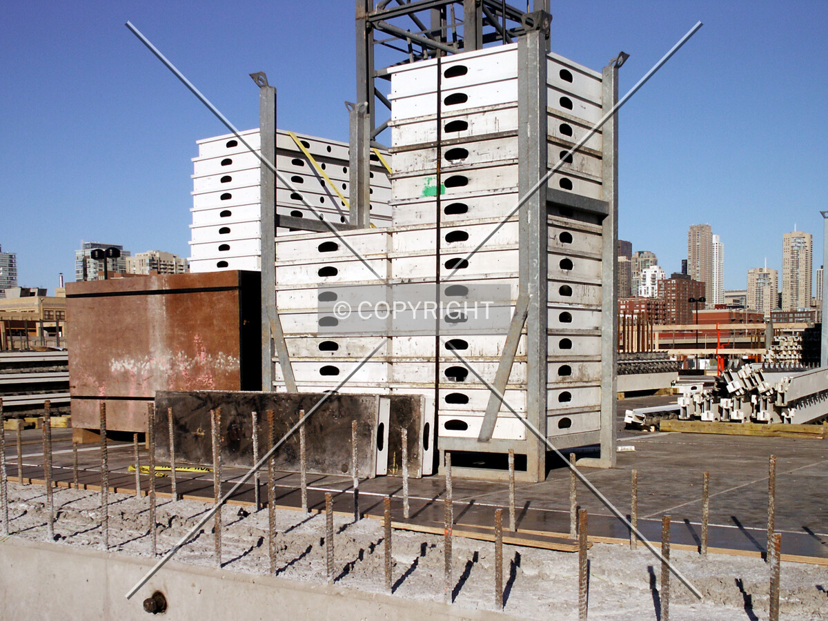 Stacks of white formwork on top of the 2nd floor platform