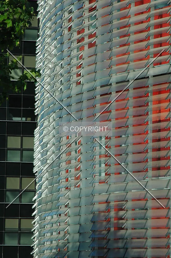 Facade contrast betwen Torre Agbar and Hotel Silken