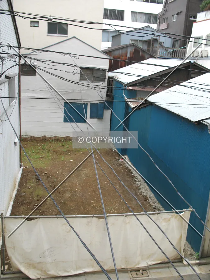 The empty plot after demolition
