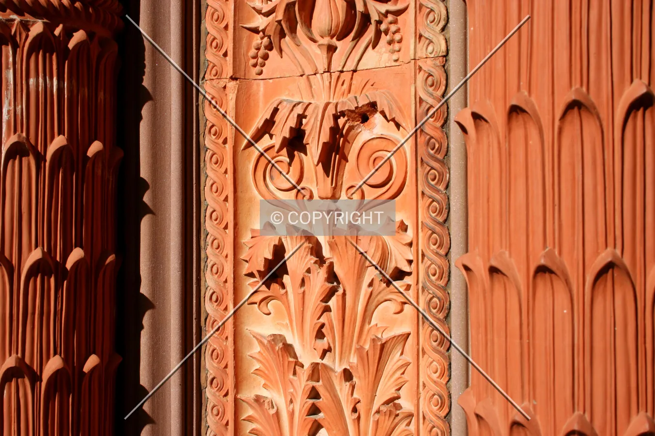 Detail of the terracotta moldings around the central doorway