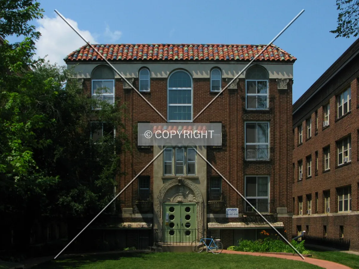 Full front elevation from across Girard Avenue South