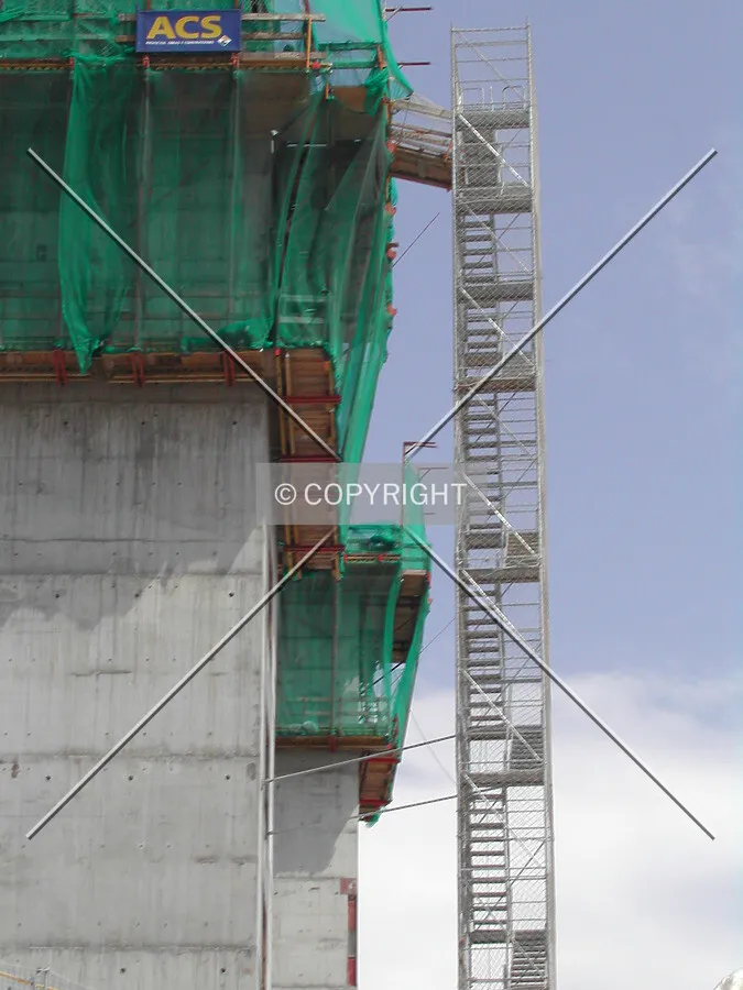 Steel stairs to the top of the concrete cores