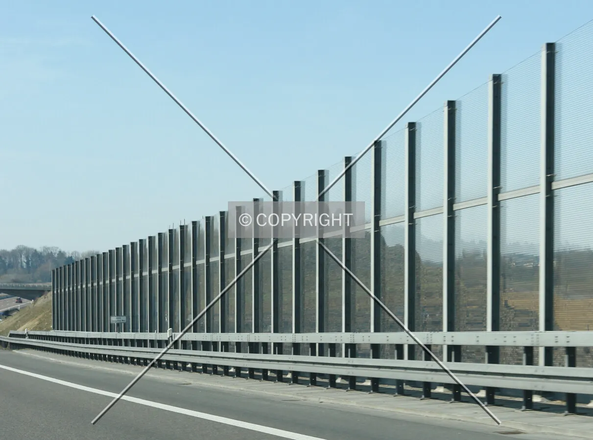 Noise mitigation wall next to a highway