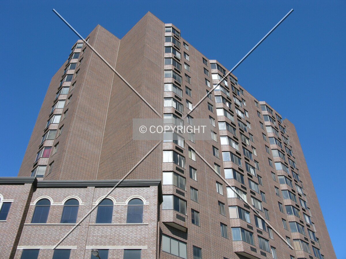 Looking up from West 7th Street