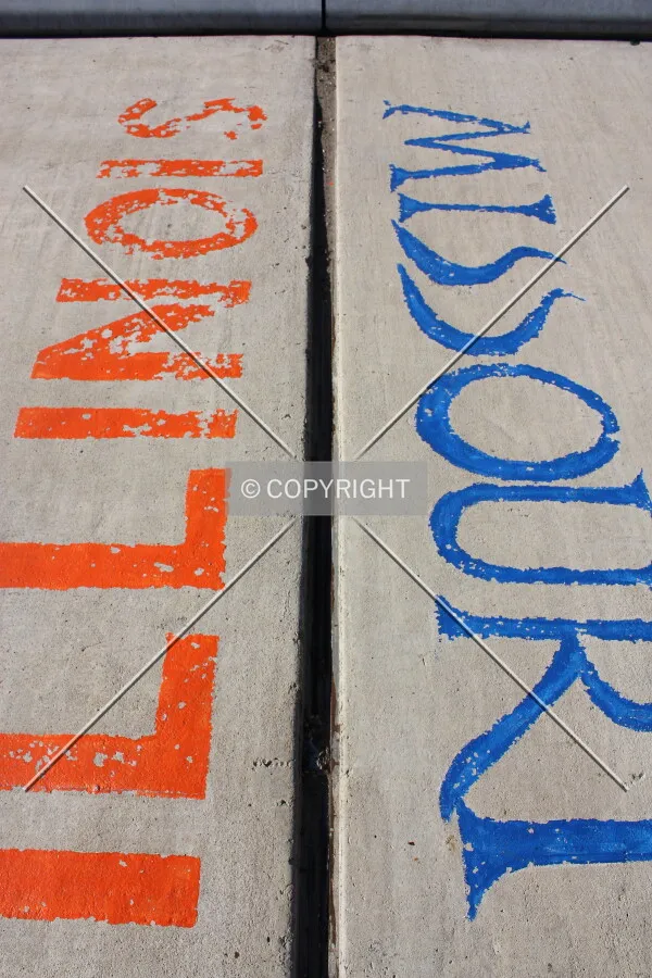 Missouri and Illinois state line indicated on the bike path