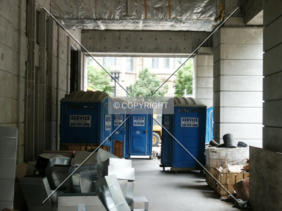 Toilets at the west end of the arcade