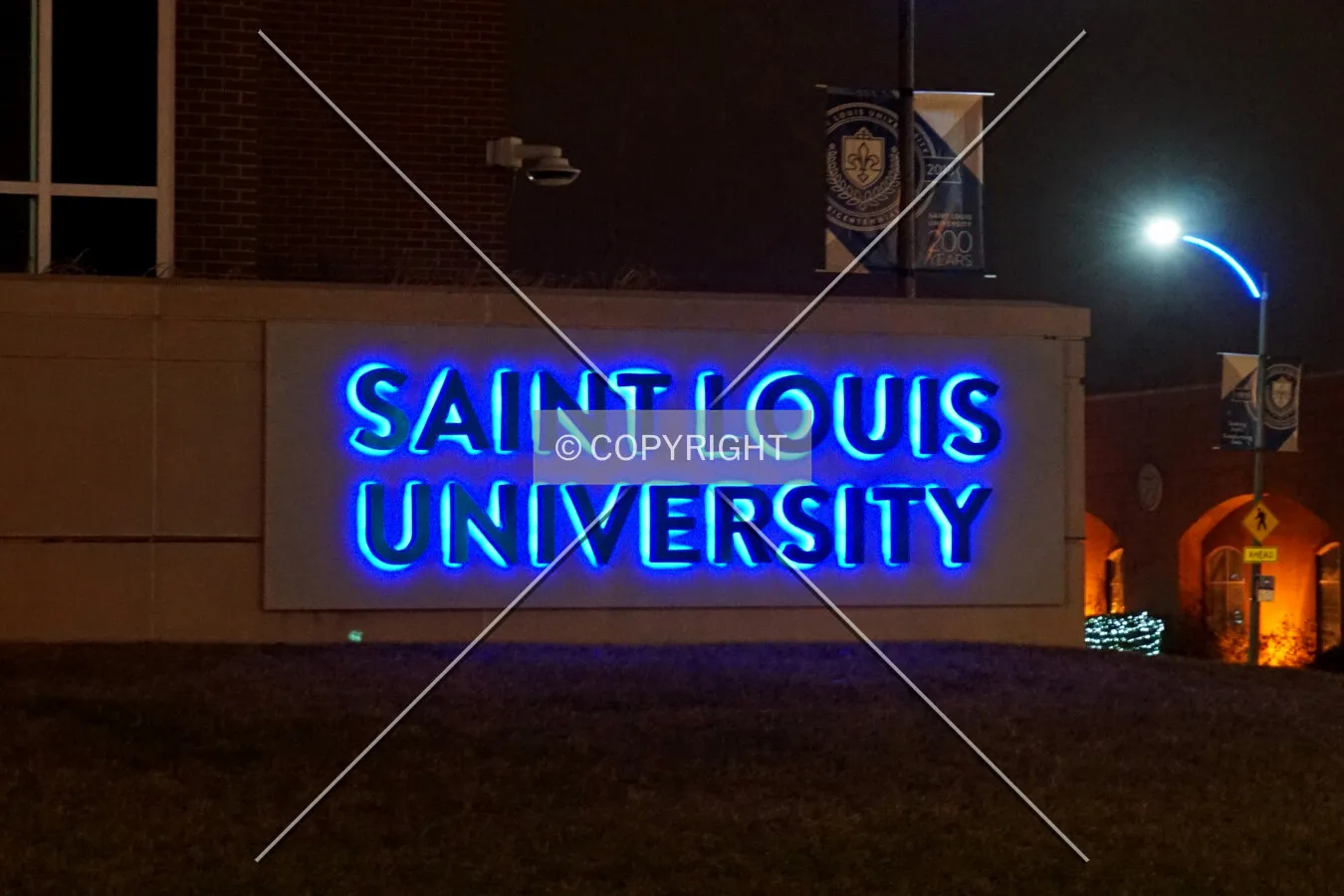 Lighted sign at the southeast corner; December 25, 2017
