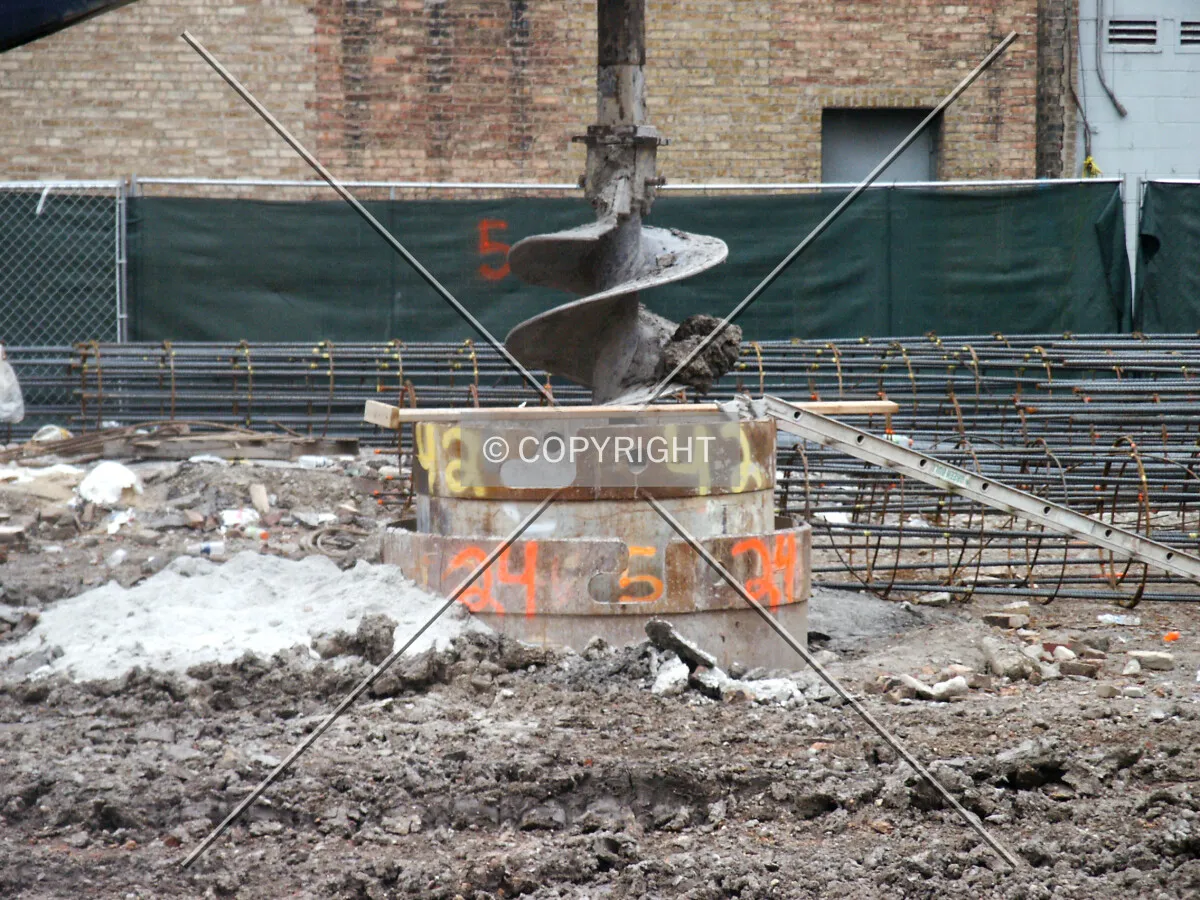 Caisson being drilled