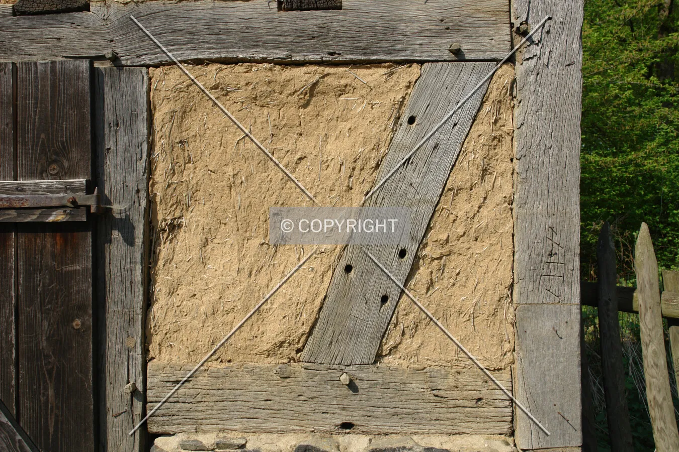 Wattle and daub facade - fully covered with daub