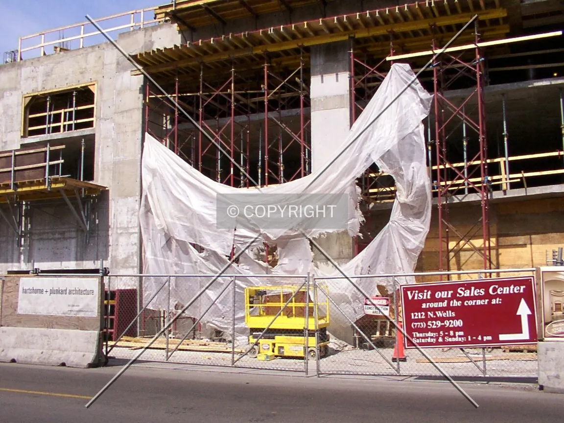 Wind-torn tarpaulin