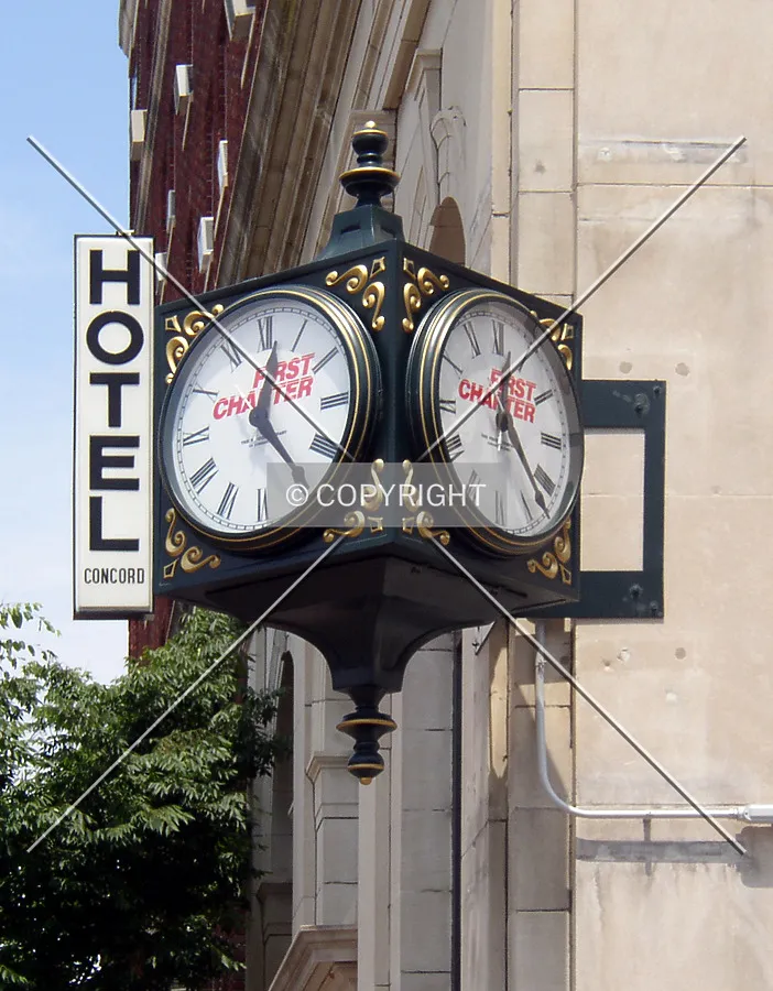 Signage and clock from Cabarrus Avenue West